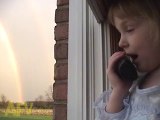 This little girl sees a rainbow heading straight for her grandmother's house! So she calls to get her fair share of the treasure.
