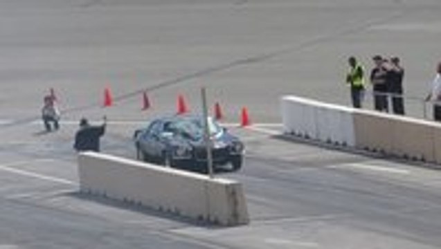 A car flips over multiple times during drag race