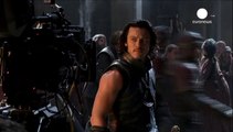 Luke Evans put on muscle and fangs for Dracula role