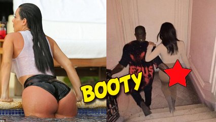 Kanye West Grabs Wifey Kim Kardashian's.......