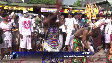 مؤمنو الجالية الصينية بتايلاند يحتلفون بالمهرجان النباتي السنوي