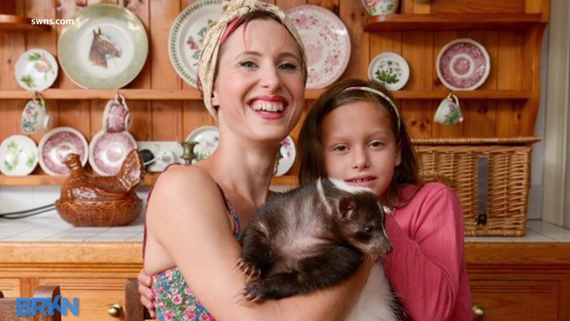 Little Girl's Best Friend Is A Skunk