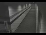 Ghost Filmed Walking down Hallway