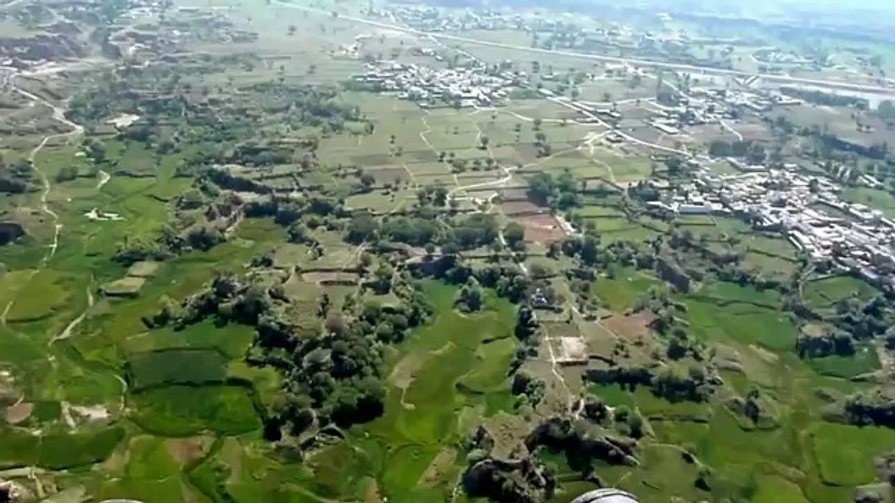 Flying in Mirpur over the banks of Mangla Dam near Akalgarh, Kashmir Pakistan