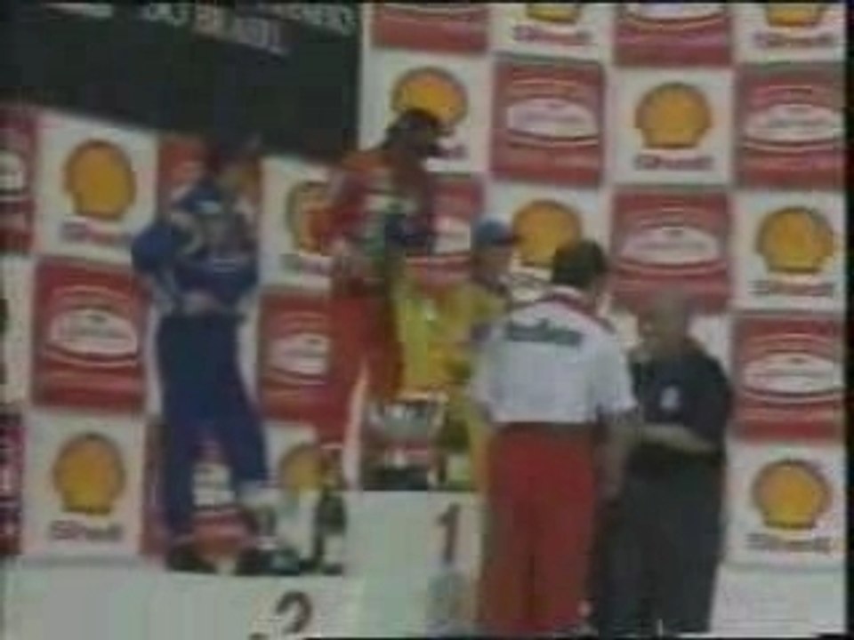 Ayrton Senna celebrates with Fangio