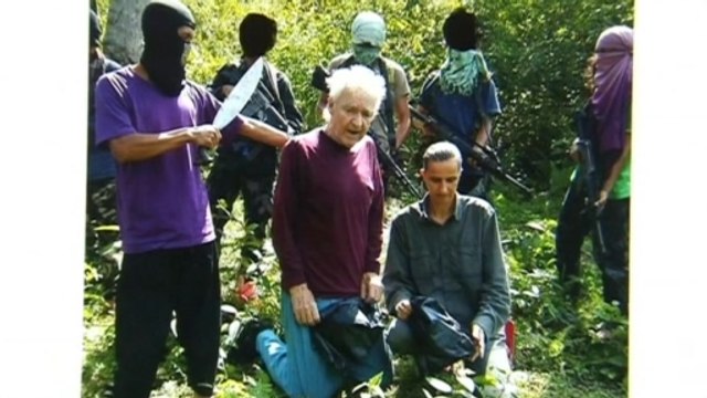 Philippine militants threaten to behead German hostage