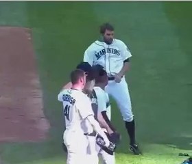 Seattle Mariners pitcher Tom Wilhelmsen on the field dancing