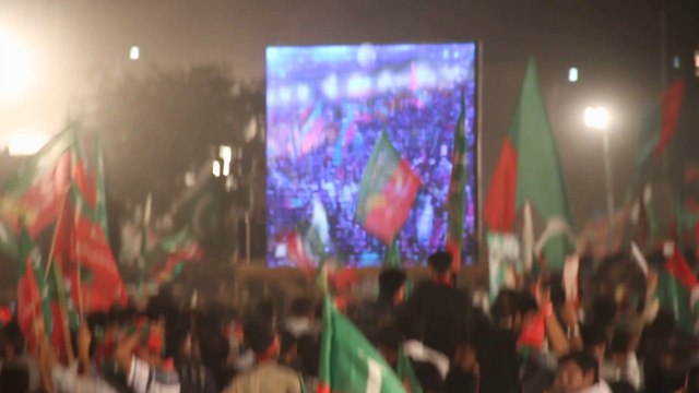 Mobile shown PTI LAHORE JALSA MINAR-E-PAKISTAN of IMRAN KHAN 28 SEP 2014 Canon ESO 7D Camera
