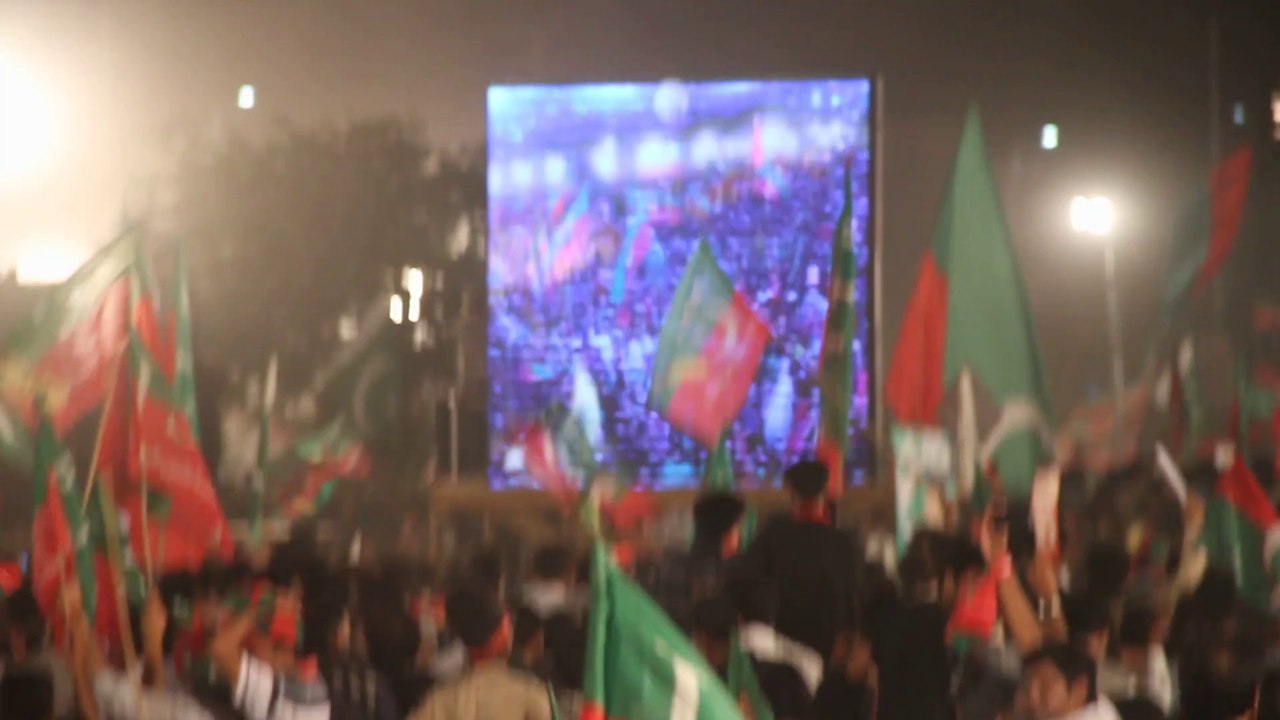 Mobile shown PTI LAHORE JALSA MINAR-E-PAKISTAN of IMRAN KHAN 28 SEP 2014 Canon ESO 7D Camera