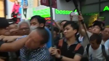 Tempers flare across Hong Kong barricades