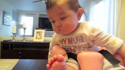 Baby Falls Asleep on A bumbo!  Looking Very Cute 2014