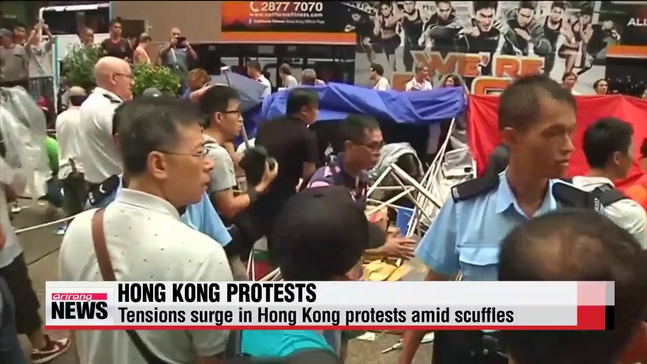 Tensions surge in Hong Kong protests amid scuffles between protesters, opponents