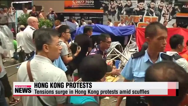Tensions surge in Hong Kong protests amid scuffles between protesters, opponents