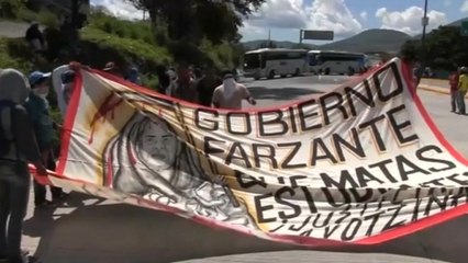 Activists protest the disappearance of dozens of students