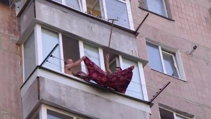 Heros of the day : 2 guys saved a kitten stuck on the top of a building
