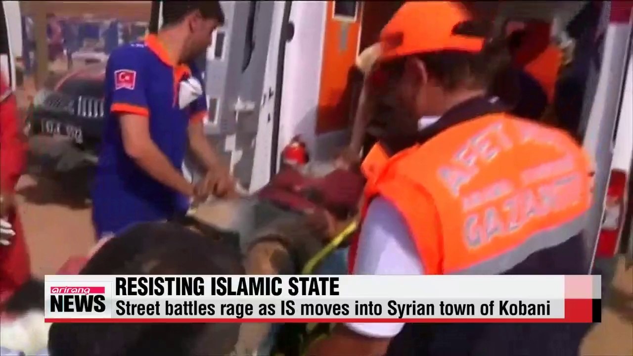 Kurdish, Islamic State fighter battle in Syria's Kobani