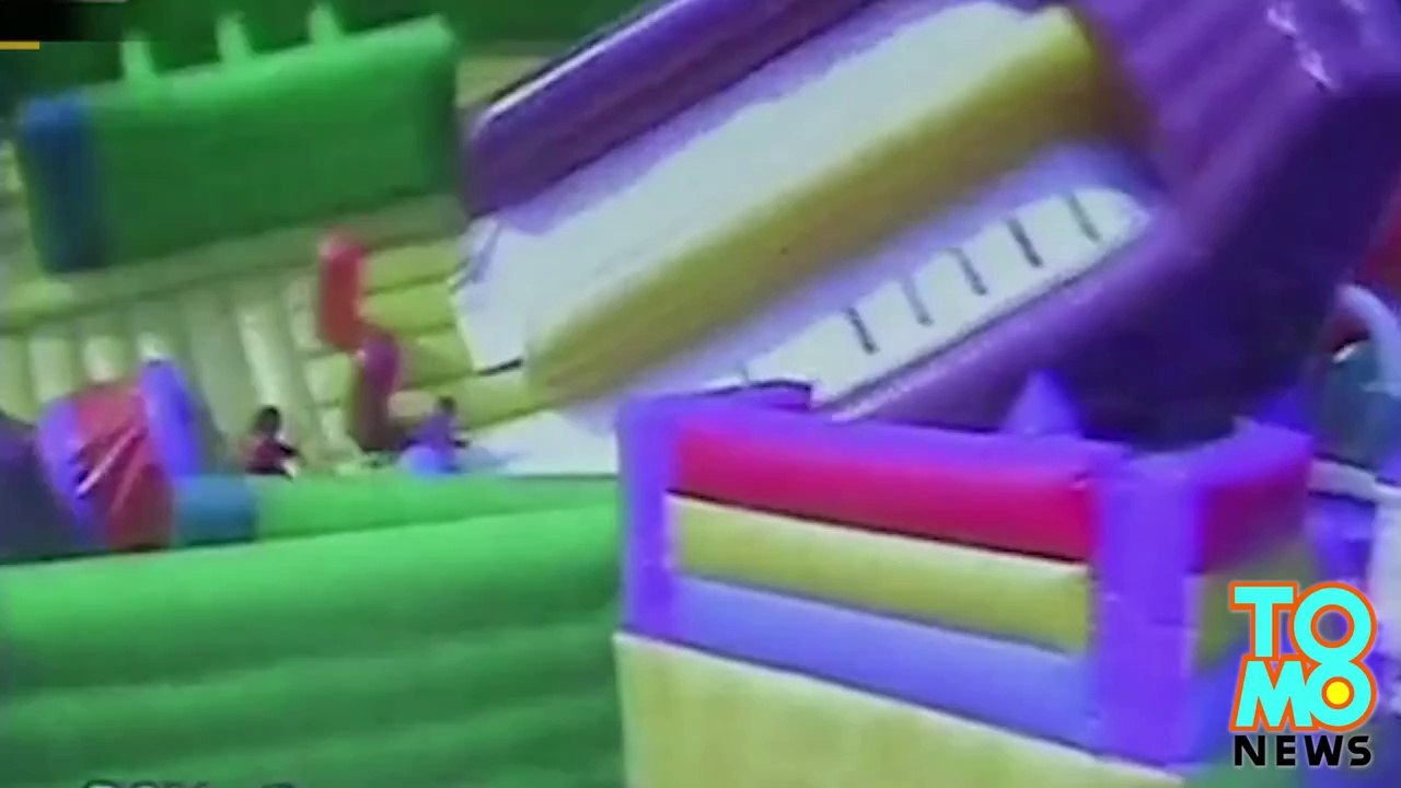 Terrifying bouncy castle accident caught on security video.