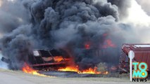 Canada train derailment - cars carrying petroleum distillate catches fire.