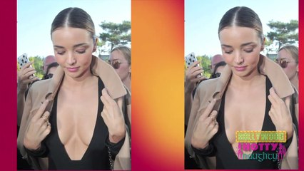 Miranda Kerr takes low cut to new lows for Paris fashion week