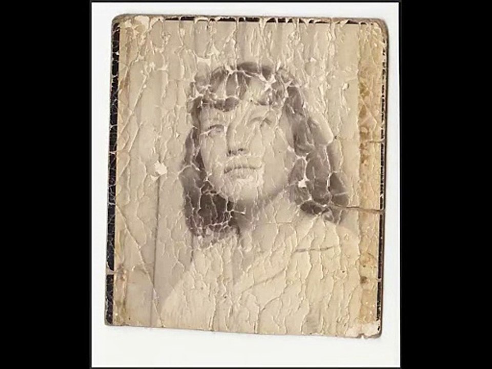 Restoration of a severely damaged photograph (c 1958)