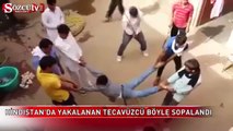 Hindistan'da yakalanan tecavüzcü böyle sopalandı