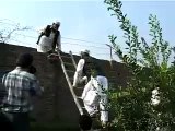 Leader Of Jamat-e-islami Climbing on Wall - Video Dailymotion