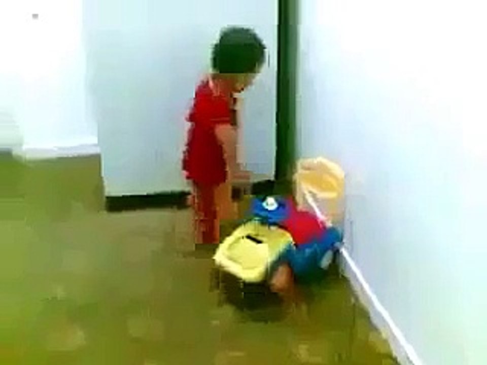 Spider Kid Climbing on Fridge