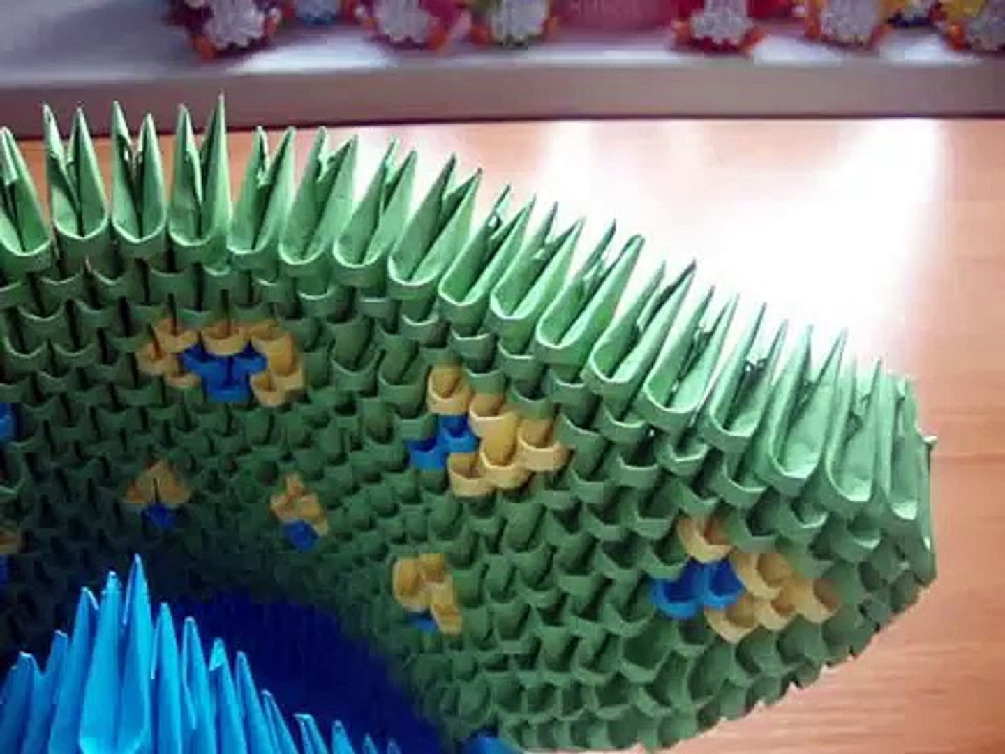 A Still Life Of A Paper Peacock Made With The Art Of Origami