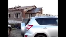 Tornado Arrives When A Car Rides Out Of The Garage