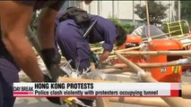 Police clash violently with protesters occupying tunnel