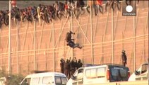 Spanish police again face wave of African migrants climbing fence into Melilla