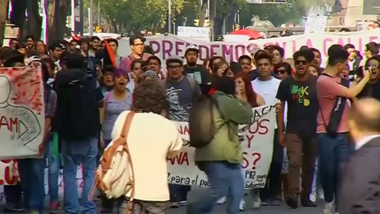 Mexican protesters attack government offices over missing students