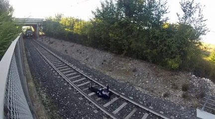 Kid Lays Down in the Middle of Train Tracks!