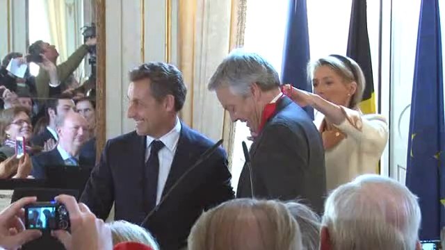 Didier Reynders reçoit les insignes de la Légion d'honneur des mains de Nicolas Sarkozy
