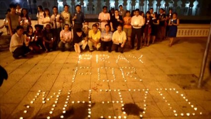 Veillée à la bougie pour les passagers du vol MH370