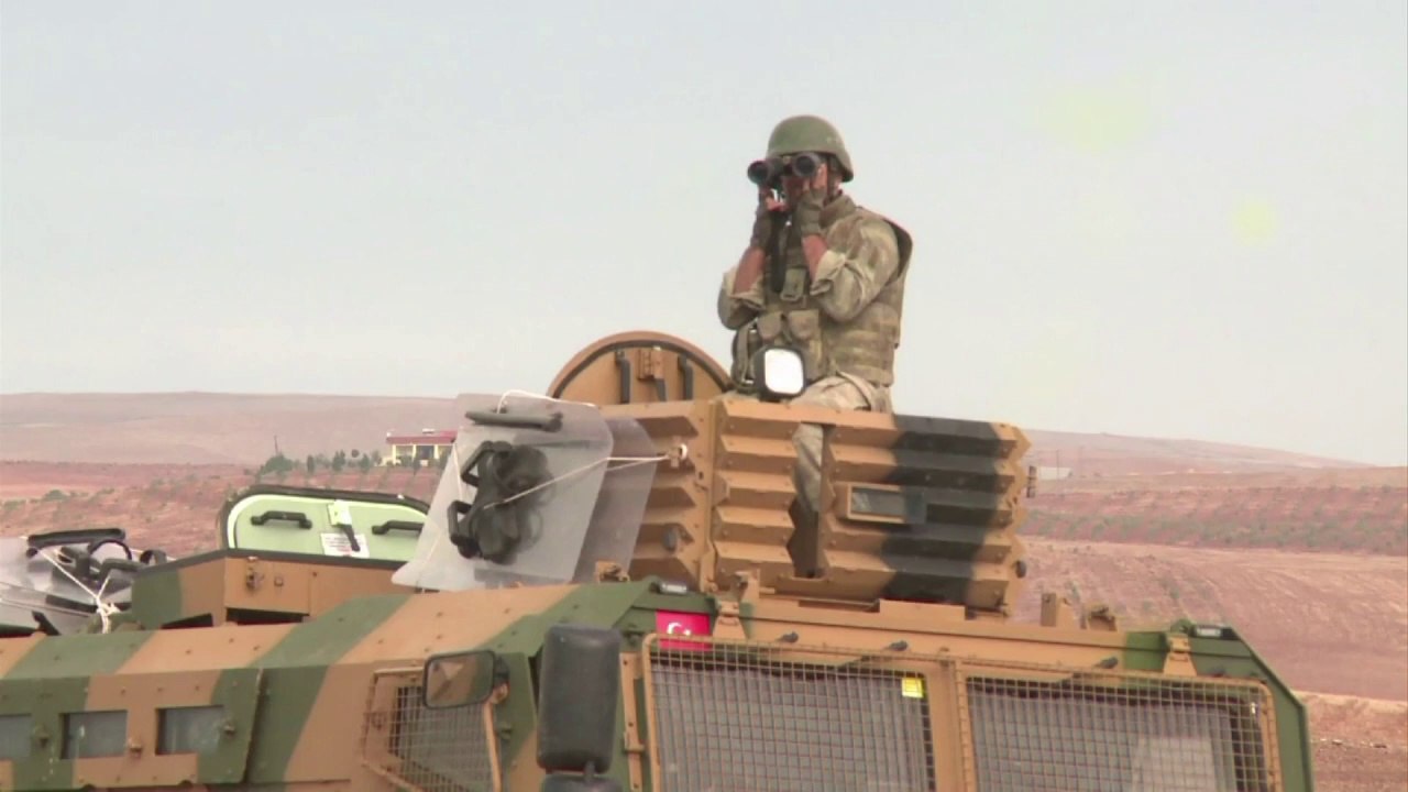 Turkey says only Syrian refugees can cross border to Kobane