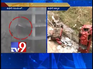 Cars blown off Visakha building by Hud Hud