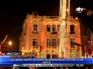 Cae cornisas y parte del frontis del edificio de la plaza Dos de Mayo