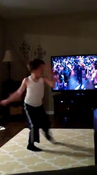 Young boy dancing like Patrick Swayze in Dirty Dancing