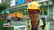 Hong Kong police clear more protest barricades