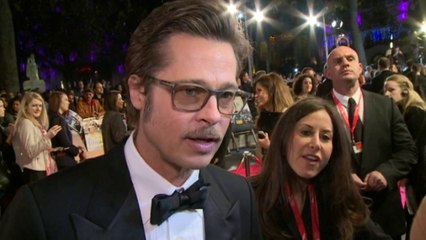 Bratt Pitt praises 'heroic' co-star Logan Lerman