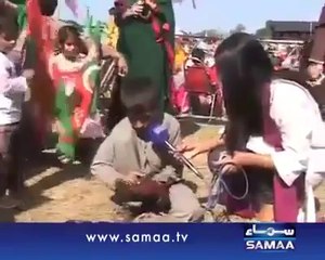 Kid in Sargodha PTI Jalsa waiting for Naya Pakistan to go to School