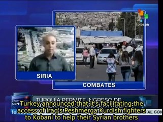 Kurdish fighters continue to resist IS offensive