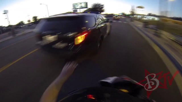 Biker Slaps A I Don't Stop For Cops Sticker On Police Car & Ends Up Getting Wrecked By Karma!