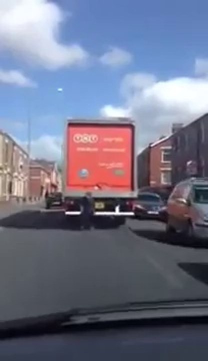 Kid on back of a truck