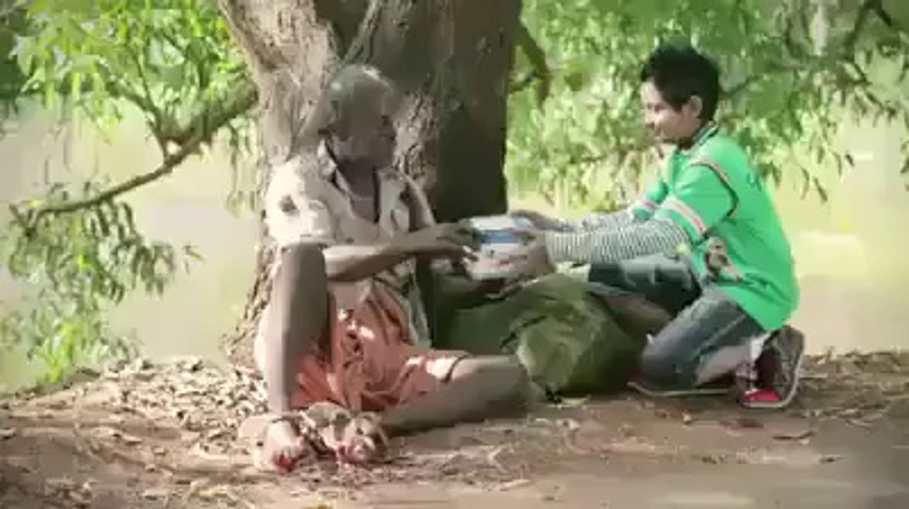 Try to Do Good Deeds yourself and teach it to your kids as well, watch how a small kid helps a Poor man on street