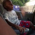 kid laughing very loudly