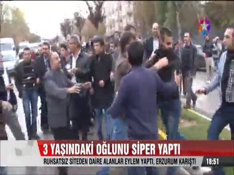 Erzurum'da bir baba 3 yaşındaki oğlunu TOMA'nın önüne siper yaptı