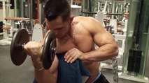 Biceps concentration curls on the preacher bench