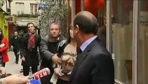 François Hollande interpellé par deux femens